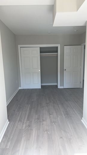 Washington apartment for rent - A room with a grey floor and white walls.
