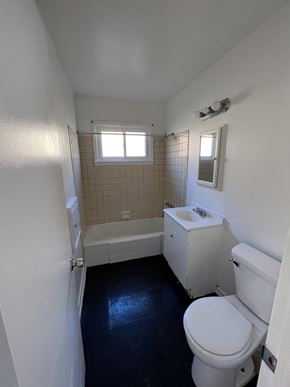 Milwaukee apartment for rent - a small bathroom with a toilet and a sink