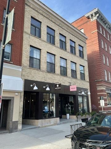 Fargo apartment for rent - a building with a car parked in front of it