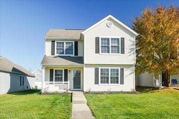Jeffersonville house for rent - A white house with a grey roof and a small porch.