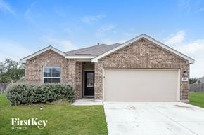 San Antonio house for rent - A brick house with a garage door and a window is for sale.