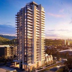 Burnaby apartment for rent - A tall residential building with balconies on each floor.