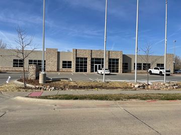 Elkhorn apartment for rent - an empty parking lot in front of a building