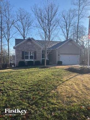 Huntersville house for rent - a house with a yard in front of it