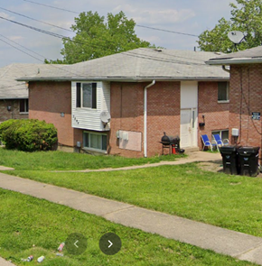 Cincinnati apartment for rent - A house with a white door and a satellite dish on the roof.