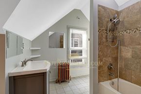 Minneapolis apartment for rent - bathroom with shower and sink in a bedroom