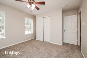 Humble house for rent - the master bedroom is spacious and has a ceiling fan