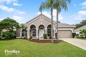 Valrico house for rent - the front of a house with palm trees