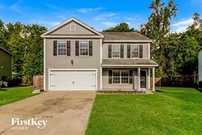 Summerville house for rent - A two-story house with a garage is for sale.