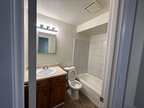 Bellevue apartment for rent - a bathroom with a sink toilet and bath tub