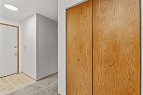 Tacoma apartment for rent - a bedroom with a closet and a door to a bathroom