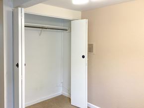 Show Low house for rent - A white door is open to a room with a carpeted floor.