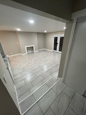 Decatur apartment for rent - A room with a fireplace and tiled flooring.