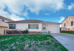 Monterey Park apartment for rent - a house with a driveway and a lawn