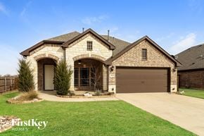 Burleson house for rent - A house with a garage and a driveway in front of it.