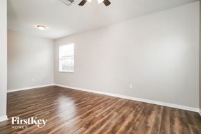 Orlando house for rent - A room with wooden flooring and a window is available for rent.