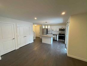 Regina apartment for rent - a view of the kitchen and dining room from the living room