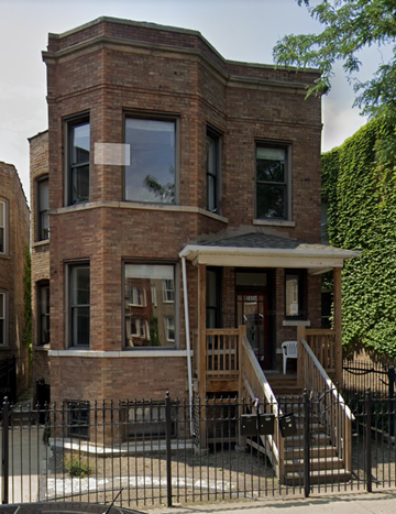 Chicago apartment for rent - a brick building with a porch and a