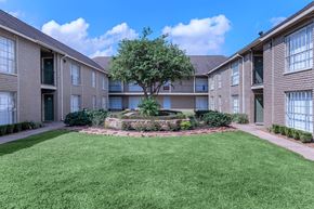 Houston apartment for rent - our apartments have a spacious courtyard and green grass