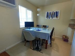 Davis apartment for rent - A dining room with a table and chairs.