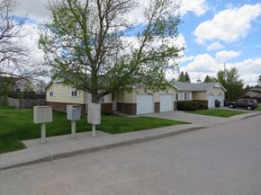 Cheyenne townhouse for rent - a row of houses on the side of a street