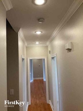 Statesville house for rent - a hallway with a hallway light and a hall way