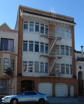 San Francisco apartment for rent - a white car is parked in front of a building