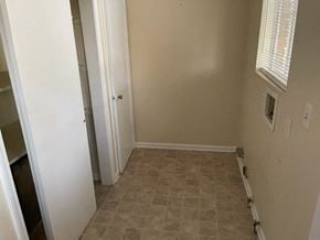 Cedartown apartment for rent - an empty room with a door and a white wall