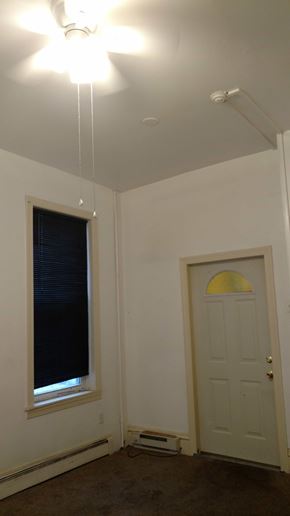Easton apartment for rent - A room with a white door and a window with blinds.