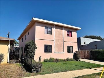 Inglewood apartment for rent - a pink house with a yard in front of it