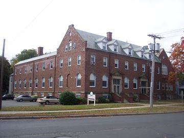 West Springfield apartment for rent - a large brick building on the corner of a street