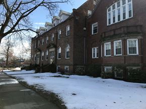 West Springfield apartment for rent - a large brick building in the snow