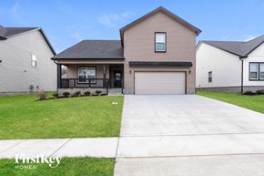 Clarksville house for rent - a large house with a driveway in front of it