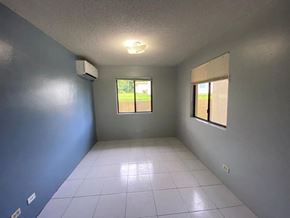 Mongmong-Toto-Maite apartment for rent - a empty room with a tile floor and a window