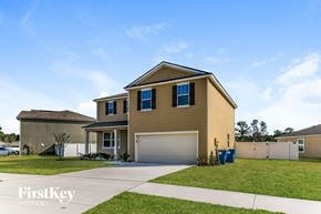 Jacksonville house for rent - A two-story house with a garage is for sale.