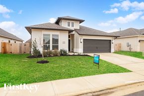 Seguin house for rent - A house with a sign in front of it that says "Firstkey".