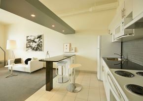 Winnipeg apartment for rent - a kitchen and a living room with a counter top