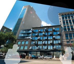 Winnipeg apartment for rent - a reflection of a tall building in a window