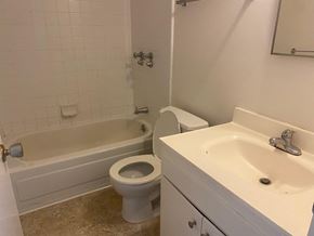 Berkeley apartment for rent - A white toilet and sink in a bathroom.