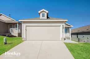 San Antonio house for rent - a white house with a white garage door