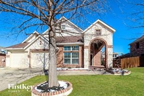 Little Elm house for rent - a home with a tree in the front yard