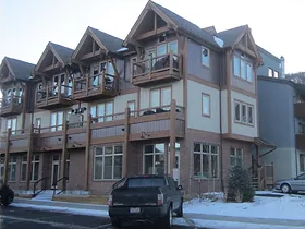 Frisco apartment for rent - A large building with a balcony on the second floor.