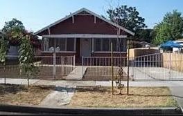 Ontario apartment for rent - a house with a fence in front of it