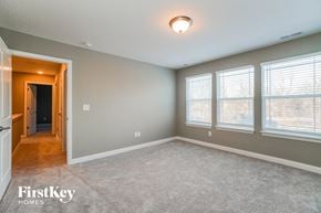 Lancaster house for rent - the master bedroom is spacious and has a walk in closet and a large window