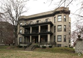 Louisville apartment for rent - an old house with a lot of stairs and a porch