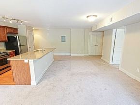 Piermont apartment for rent - A kitchen with a refrigerator, microwave, and oven.