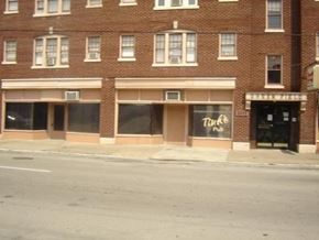 Louisville apartment for rent - an empty street in front of a brick building