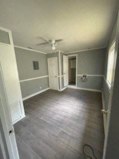 Hattiesburg apartment for rent - A room with a ceiling fan and light, wooden floors, and a white door.