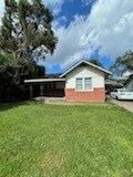 Hattiesburg apartment for rent - A house with a white car parked in front.