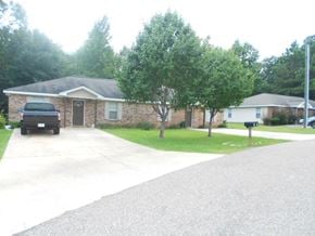 Purvis apartment for rent - a house with a truck parked in the driveway